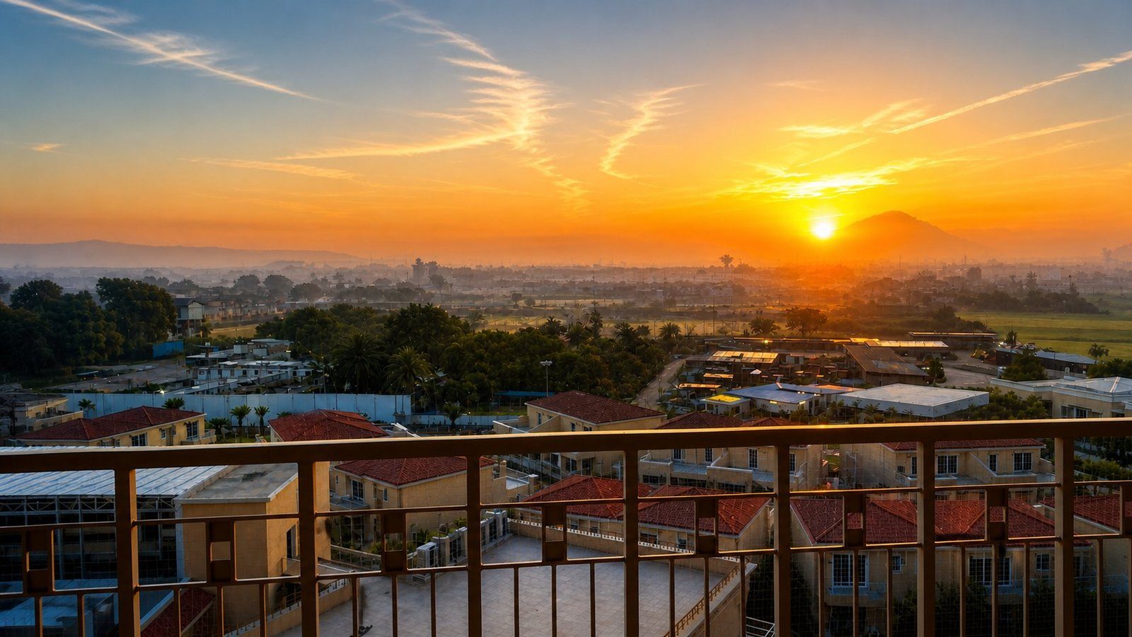 Sunrise behind the Aravalli range as seen from the balcony